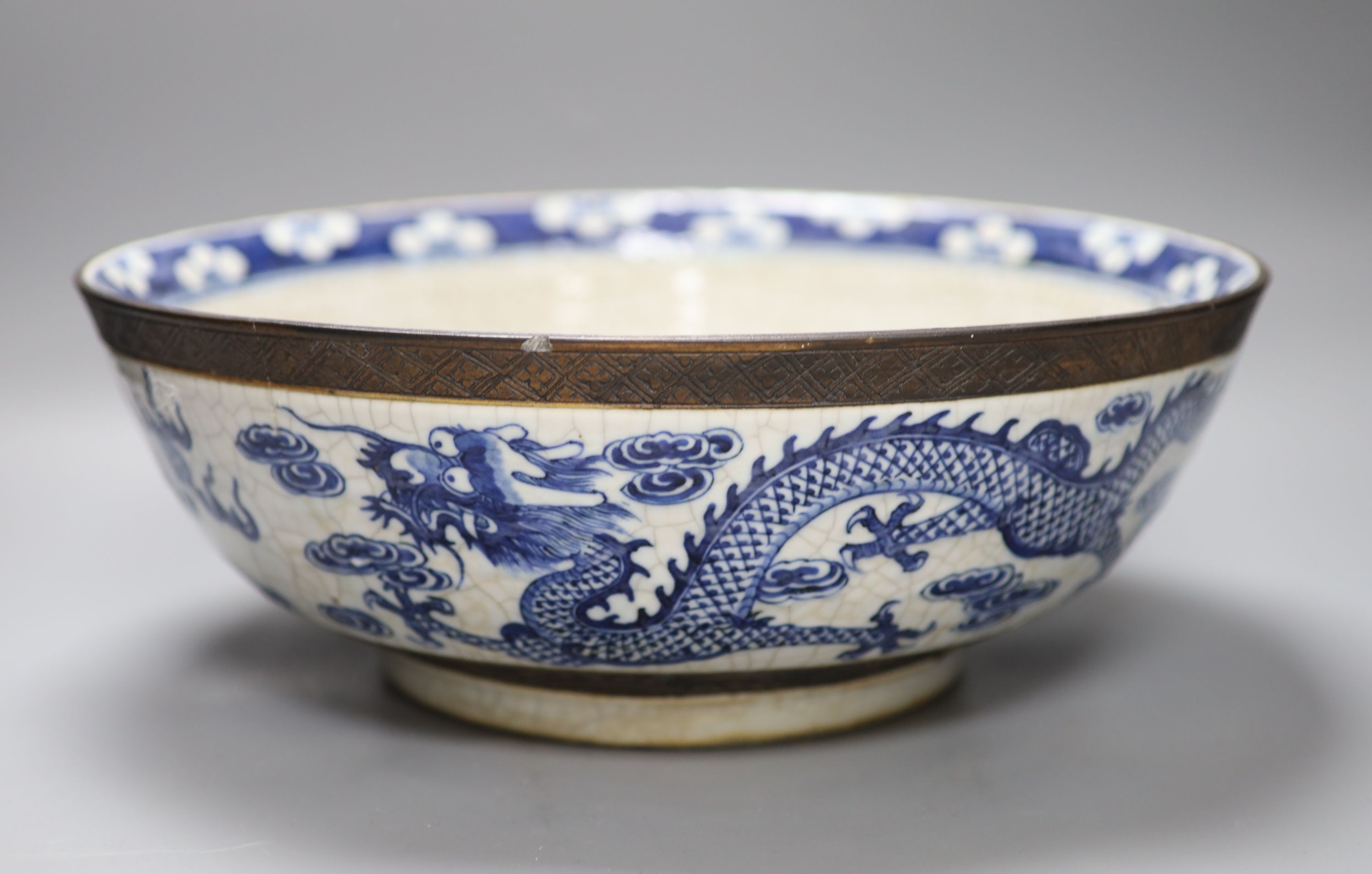 A large Chinese blue and white crackle glazed dragon bowl, 19th century, diameter 37cm